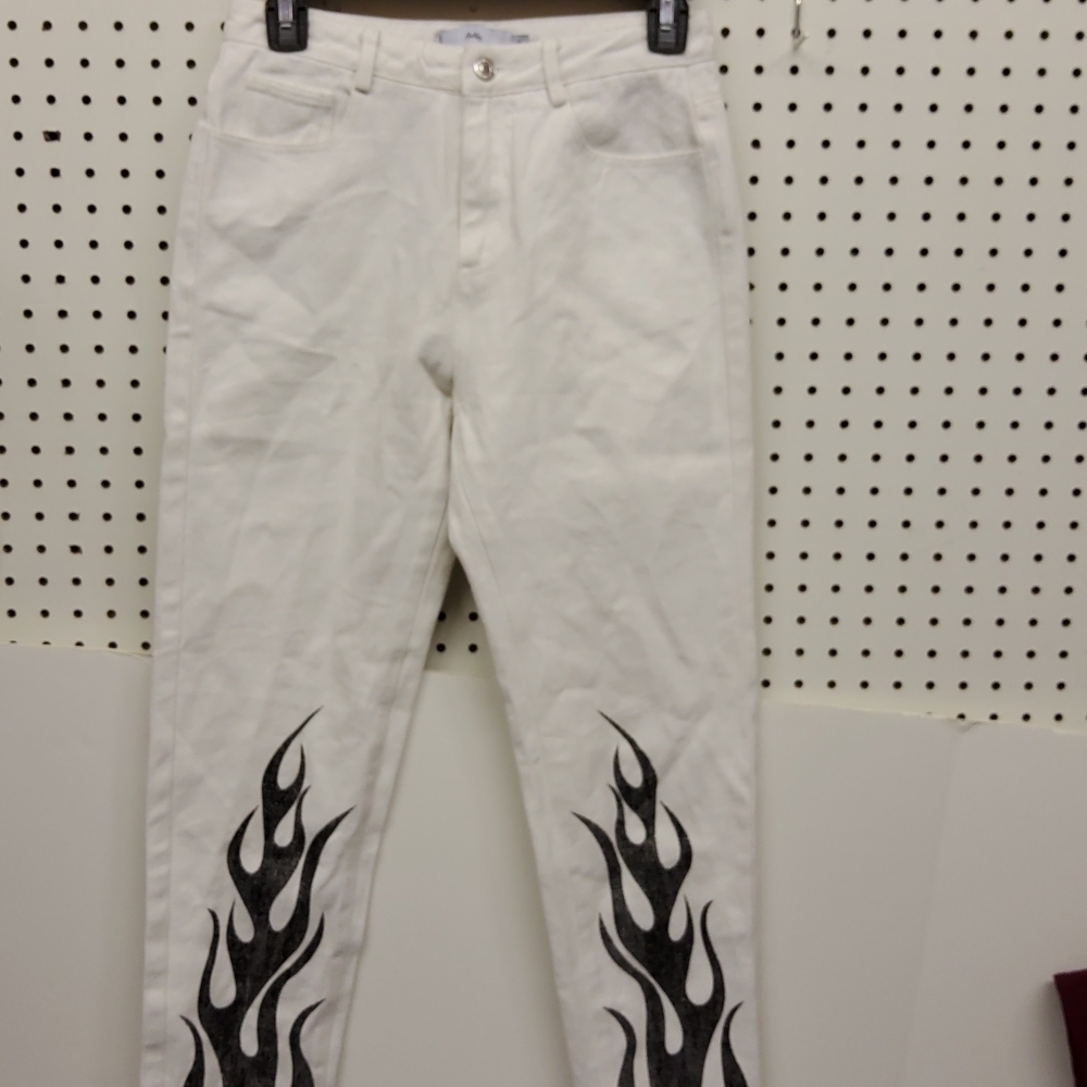 ADIKA jeans white with black flames accents lower legs.  NWOT size small